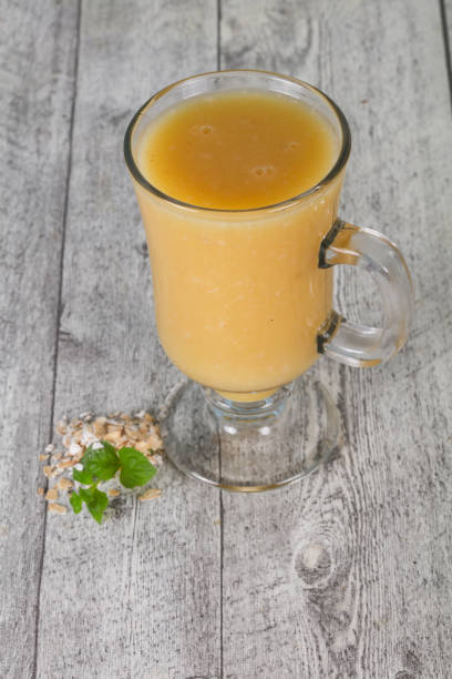 istock Dietary vegetarian oats milk over wooden 1249385274