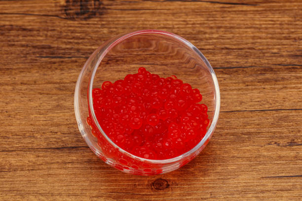 istock Red salmon caviar in the bowl 1249385281