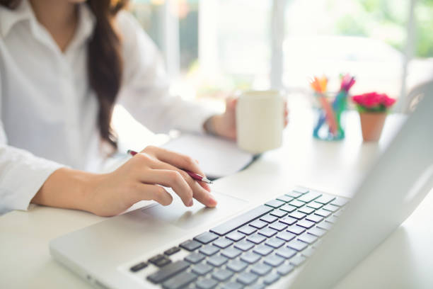 istock Hands of an office woman using laptop 1249385337