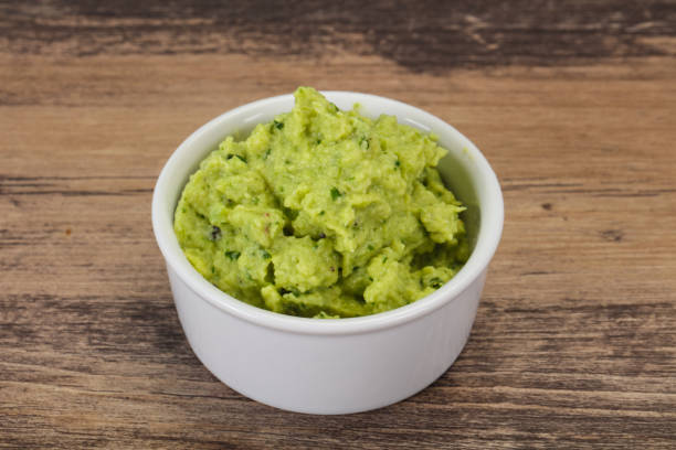istock Avocado guacamole sauce with chili pepper 1249386210