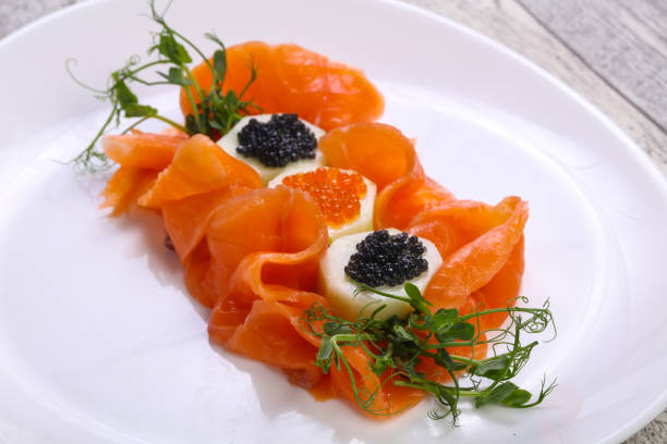 istock Sliced salmon with caviar 1249386662