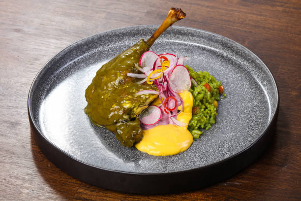 istock Lamb leg with green rice 1249386811