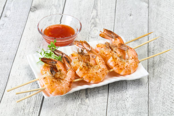 istock Grilled prawn skewer with sauce 1249386824
