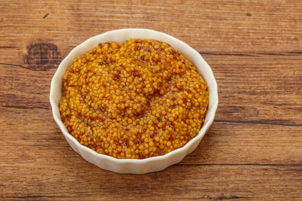 istock Dijon mustard sauce with seeds 1249386936