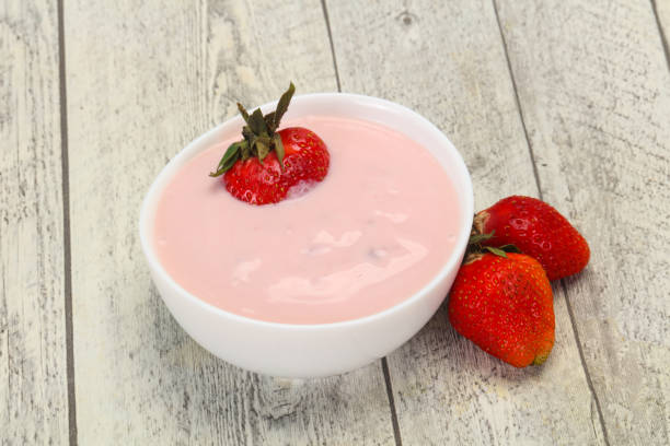 istock Yoghurt with strawberry in the bowl 1249387180