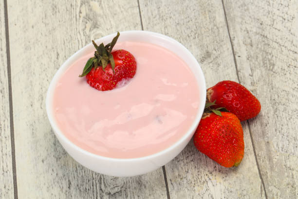 istock Yoghurt with strawberry in the bowl 1249387736