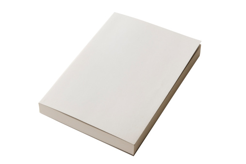 Isolated shot of closed blank book on white background