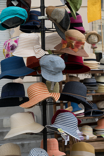 Berlin, Germany - June 10, 2020: Pile of hats for sale