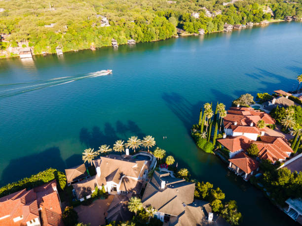 istock Boat going down Colorado River view from Mount Bonnell in Austin Texas 1249401813
