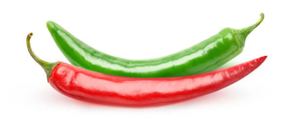 istock Two isolated hot chili peppers (red and green) 1249407638