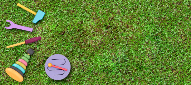 istock baby toys on grass background 1249408912