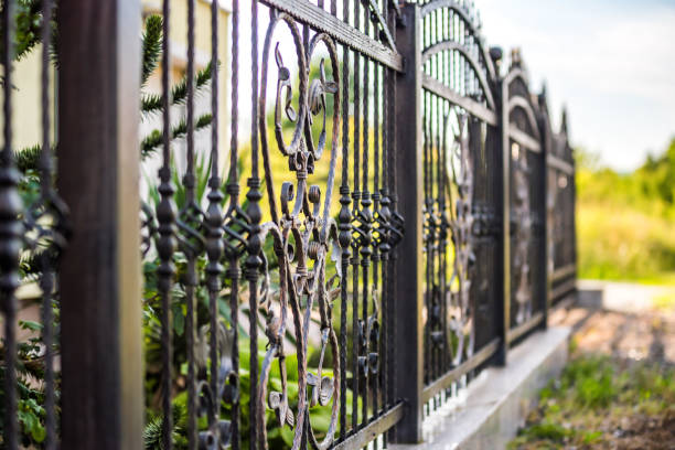 Wrought Iron Fence Metal fence wrought iron stock pictures, royalty-free photos & images