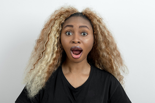 Young woman with surprised expression