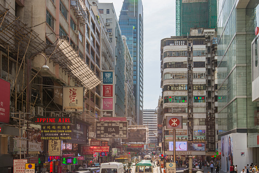 People walking in the street at downtown Hong Kong city.