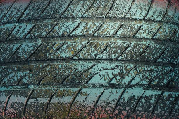 istock plastic background from an old dirty car tire 1249420226