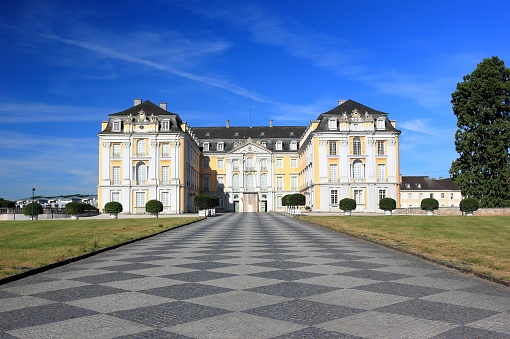 Brühl, Germany – June 02, 2020: Visiting the Baroque Augustusburg Palace on a sunny morning in June.