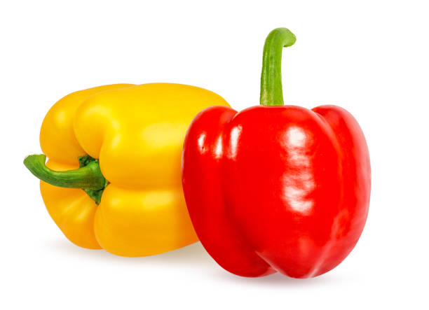istock Peppers red and yellow bell isolated on white background with clipping path 1249429093