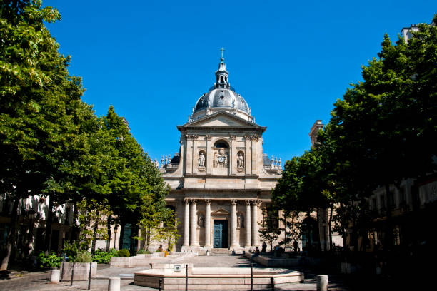 Sorbonne university main building and square in Paris with blue sky. Place de la Sorbonne with no more people few days after the Covid 19 virus lockdown in Paris. France - June 1, 2020