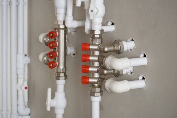 Gas pipe and valve on the wall.