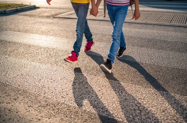 istock Close-up kids on crosswalks 1249437301