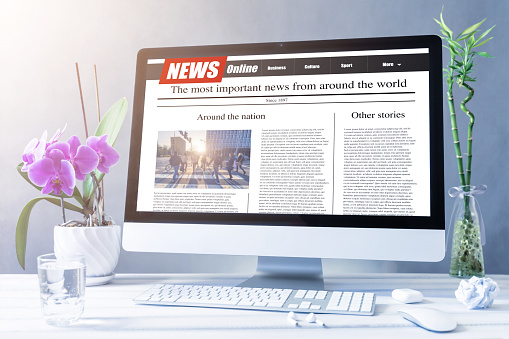 news on a computer screen. Mockup website. Newspaper and portal on internet.
