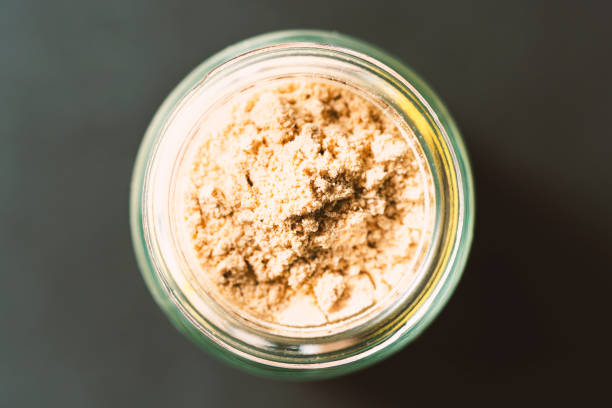 istock Ginger powder in glass jar 1249451751