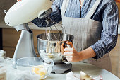 Unrecognizable Woman Using a Stand Mixer in the Kitchen