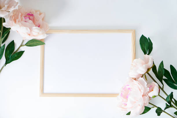 istock White mock up poster .Home decor, interior with frame and plant 1249459559
