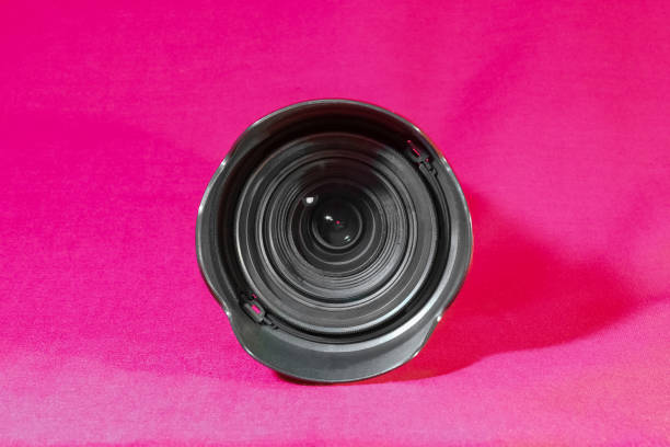 istock camera lens on a black and backgroud 1249461409