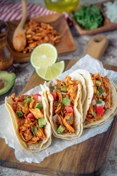 istock mexican shredded chicken tacos with ingredients 1249463956
