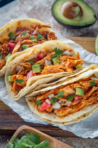 istock mexican shredded chicken tacos with ingredients 1249463958