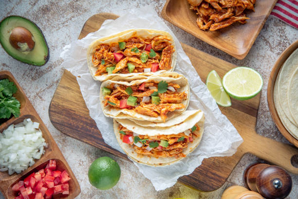istock mexican shredded chicken tacos with ingredients 1249463964