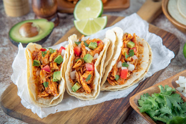istock mexican shredded chicken tacos with ingredients 1249463968