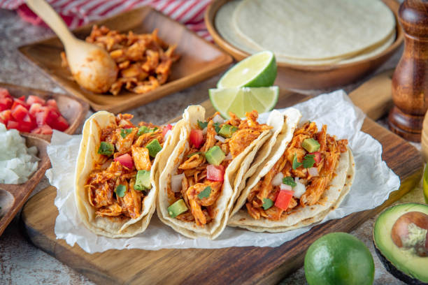 istock mexican shredded chicken tacos with ingredients 1249463971