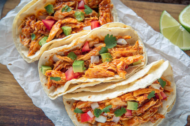 istock mexican shredded chicken tacos with ingredients 1249463975