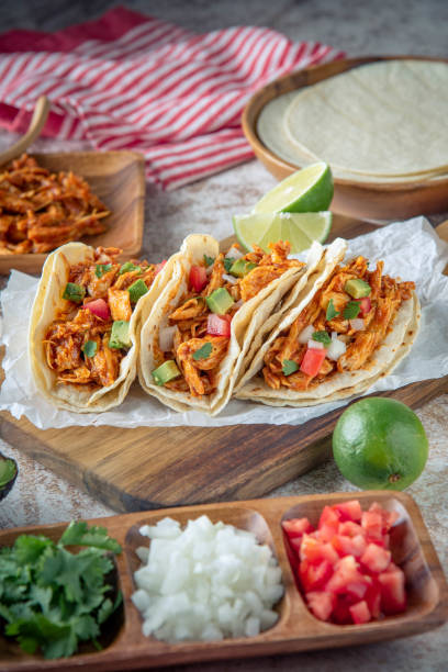 istock mexican shredded chicken tacos with ingredients 1249463979