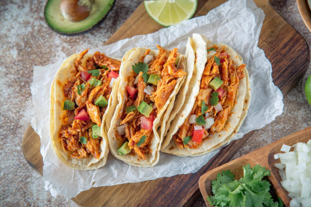 istock mexican shredded chicken tacos with ingredients 1249463981