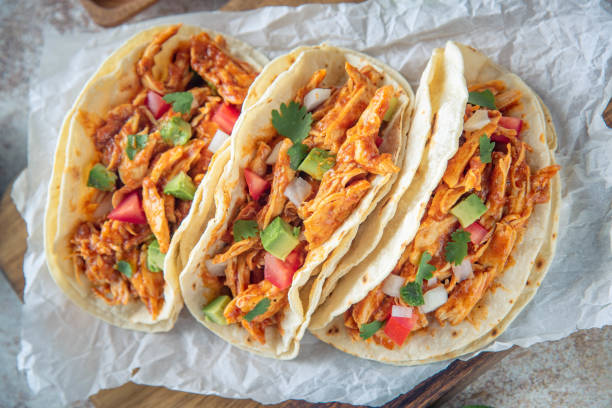 istock mexican shredded chicken tacos with ingredients 1249463998