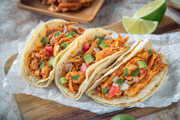 istock mexican shredded chicken tacos with ingredients 1249464016
