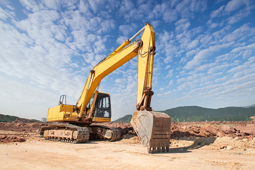 huge heavy shovel excavator digger on gravel construction site