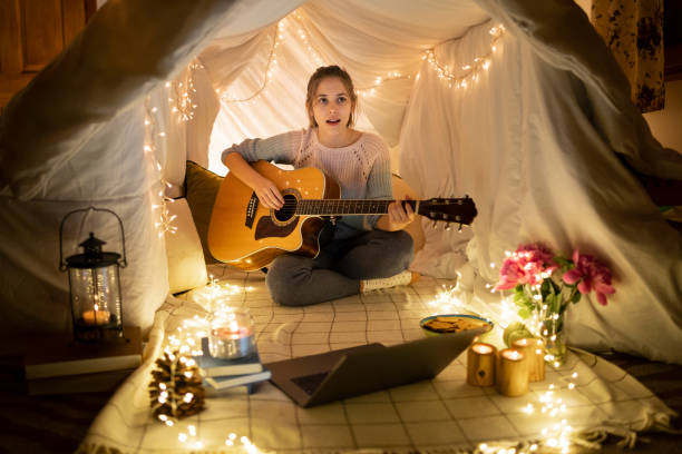 istock Teen performing at home 1249466125