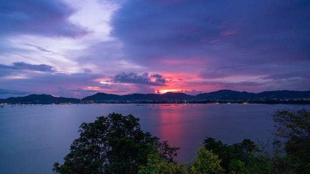 istock Beautiful light sunset over sea dramatic sky. 1249470044