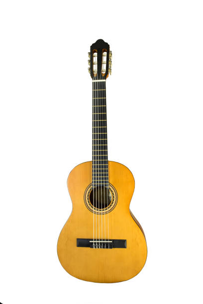 istock Brown acoustic wooden guitar stands vertically on a white background 1249471081