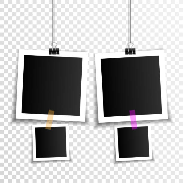 Set of empty photo frames with binder clips and adhesive tape Set of empty photo frames with binder clips and adhesive tape bulletin board photos stock illustrations