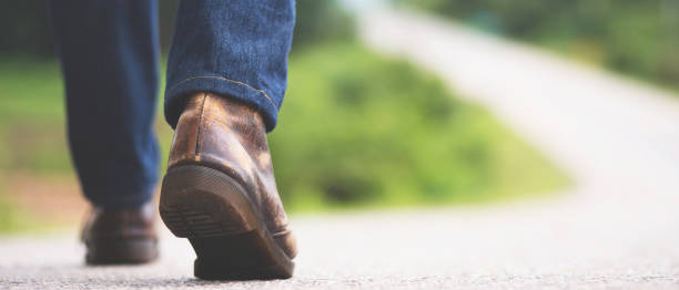 istock A man walking on the street 1249477411