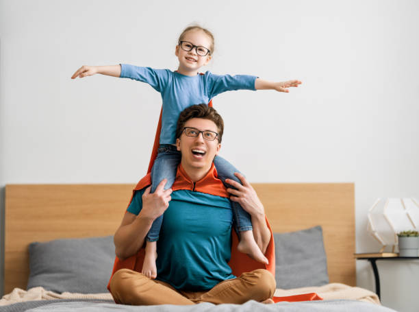 istock Girl and daddy in Superhero costume 1249483821