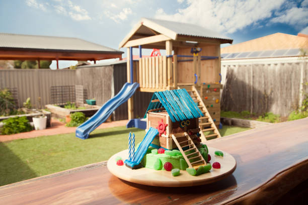 istock Special birthday cake and matching cubby house 1249486881