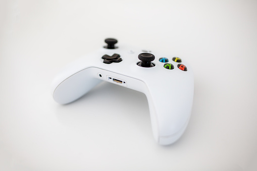 Perth, Australia - 22nd April 2020: White wireless Xbox controller isolated on a white background