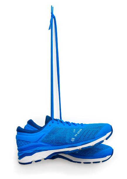 istock Running Shoes Hanging From A Hook 1249496769