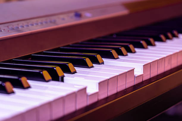 istock Piano keys on a beautiful colored background. 1249503303